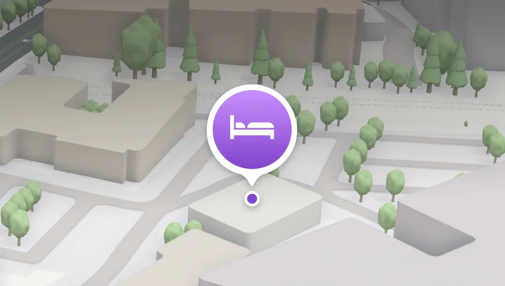 Marcador de un negocio en Mapas de Apple que abre la ficha gestionada con Apple Business Connect