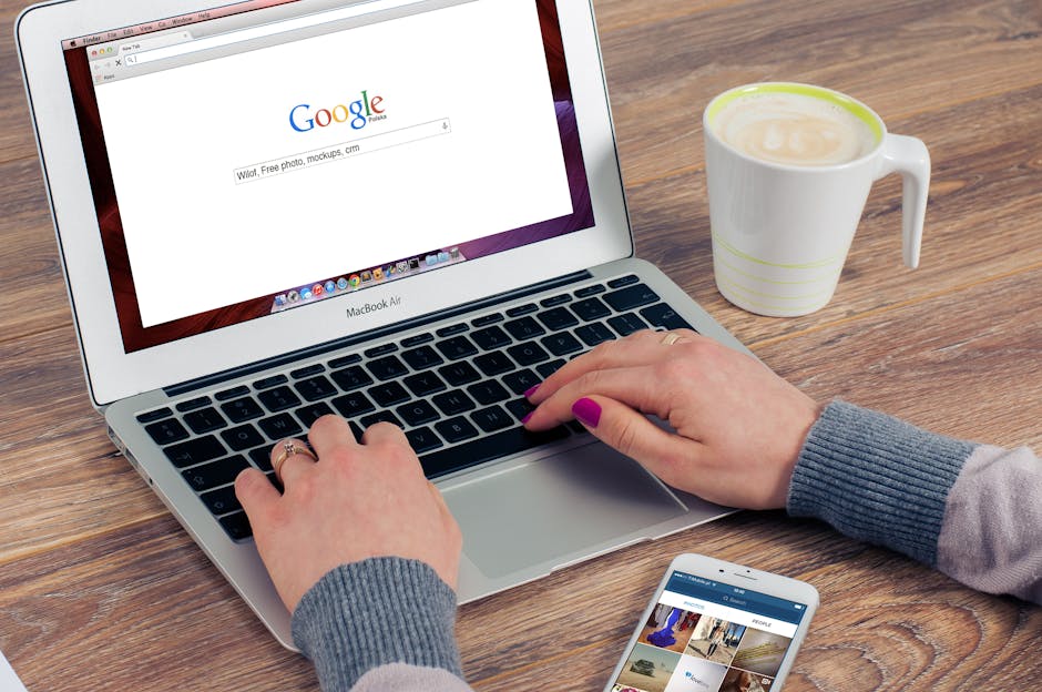 Person working on a Google My Business listing with a cafe next to it