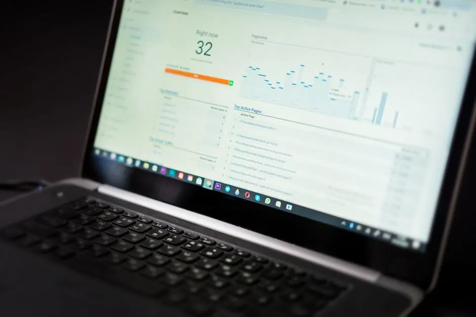 Un ordenador que muestra un panel de análisis con herramientas de seguimiento y análisis de datos en tiempo real.